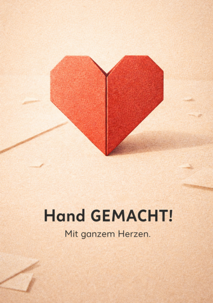 Paper origami heart on a textured beige background